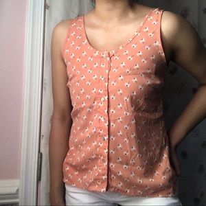 Sleeveless floral button up blouse